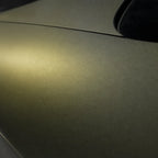 Close-up of Gold Green satin colored PPF surface texture | Veloro