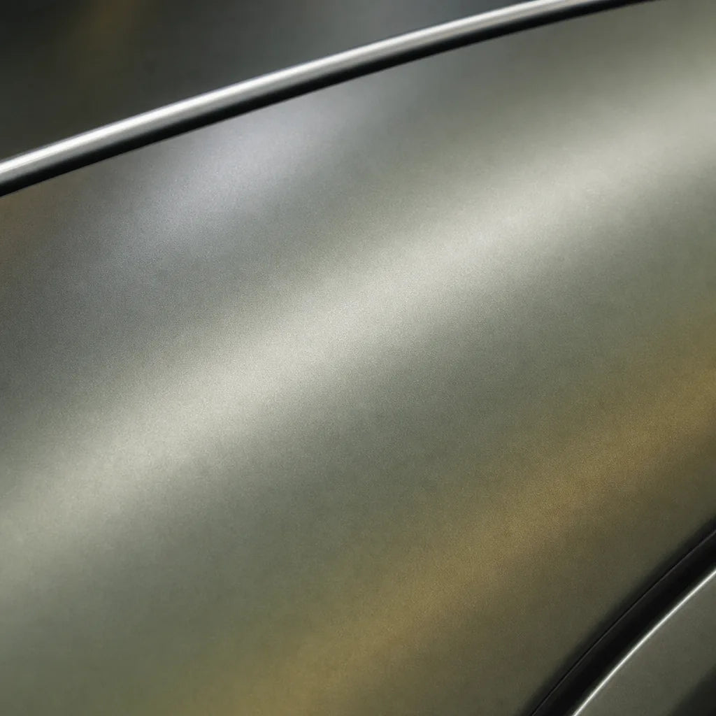 Close-up of Liquid Metallic Bronze satin colored PPF surface texture | Veloro