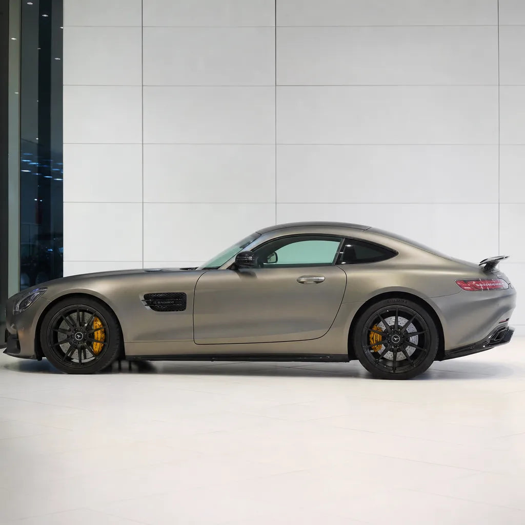 Metallic DBX Purple satin colored PPF wrapped on a Mercedes-AMG GT side profile | Veloro