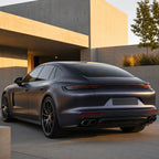 Luxury car wrapped in Racing Blue satin colored PPF at golden hour | Veloro