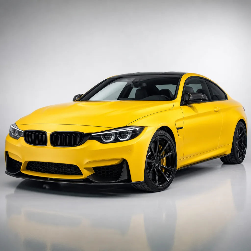 Racing Yellow satin colored PPF wrapped on a BMW M4 | Veloro