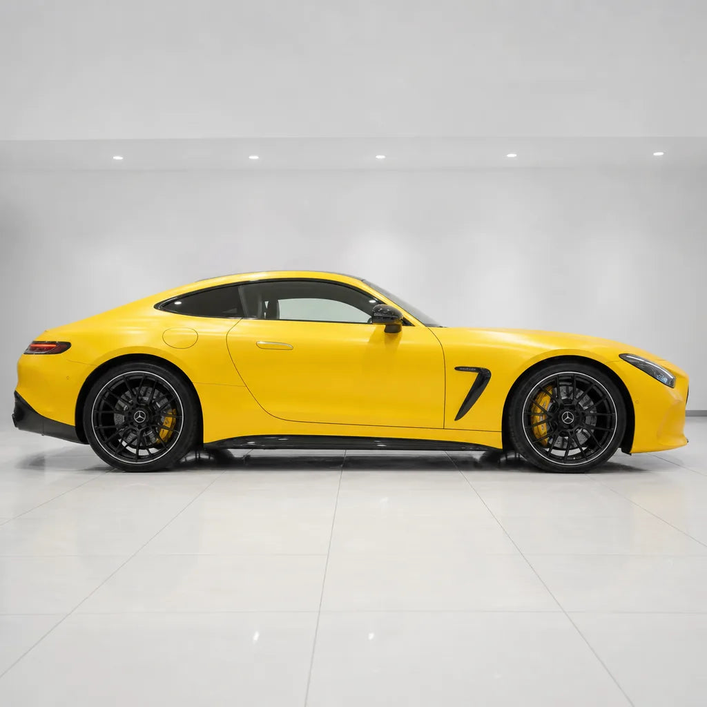 Racing Yellow satin colored PPF wrapped on a Mercedes-AMG GT side profile | Veloro