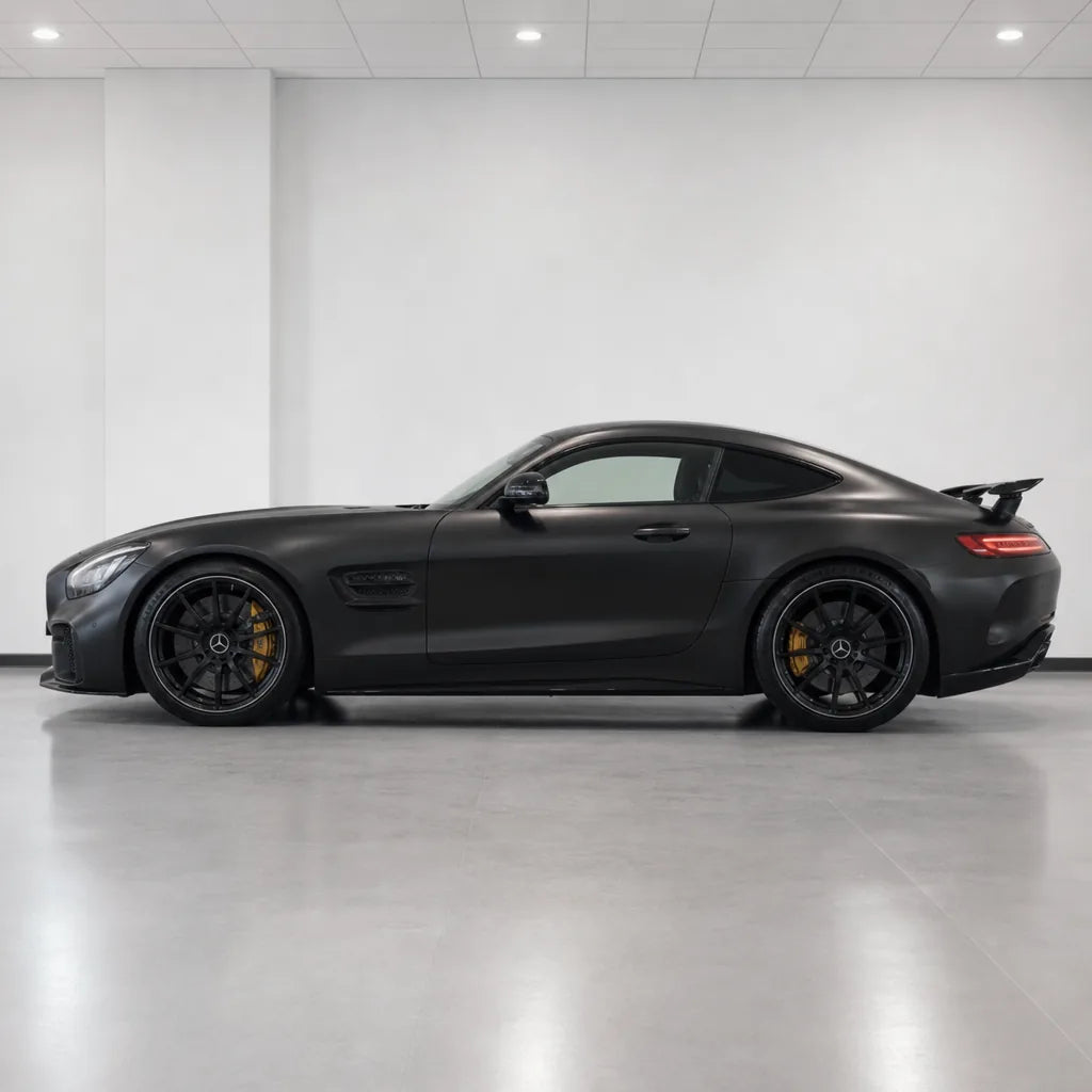 Stealth Black satin colored PPF wrapped on a Mercedes-AMG GT side profile | Veloro