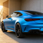 Luxury car wrapped in Tunisian Blue satin colored PPF at golden hour | Veloro