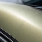 Close-up of Twilight Gold satin colored PPF surface texture | Veloro