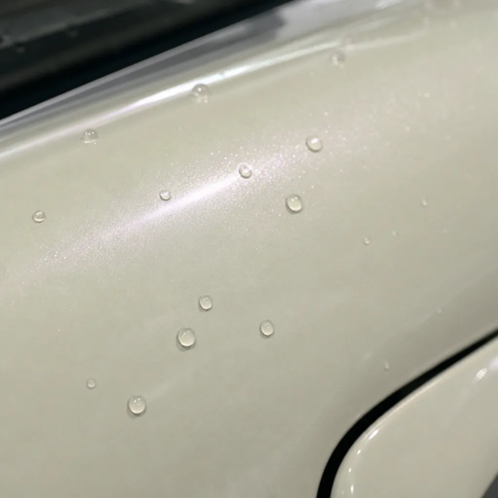 Close-up of Transparent Purple Diamond gloss colored PPF surface texture | Veloro