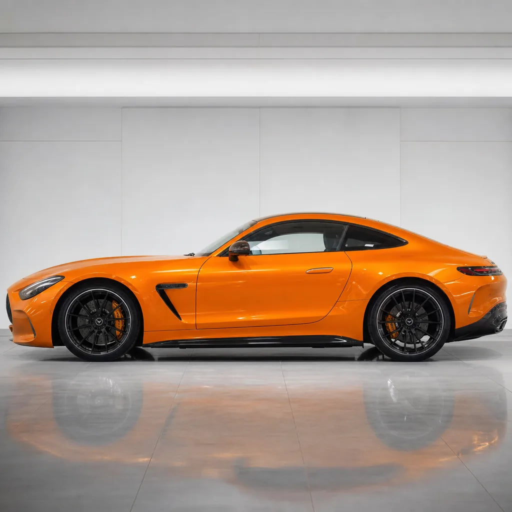 Ultimate Flat Gold Orange gloss colored PPF wrapped on a Mercedes-AMG GT side profile | Veloro