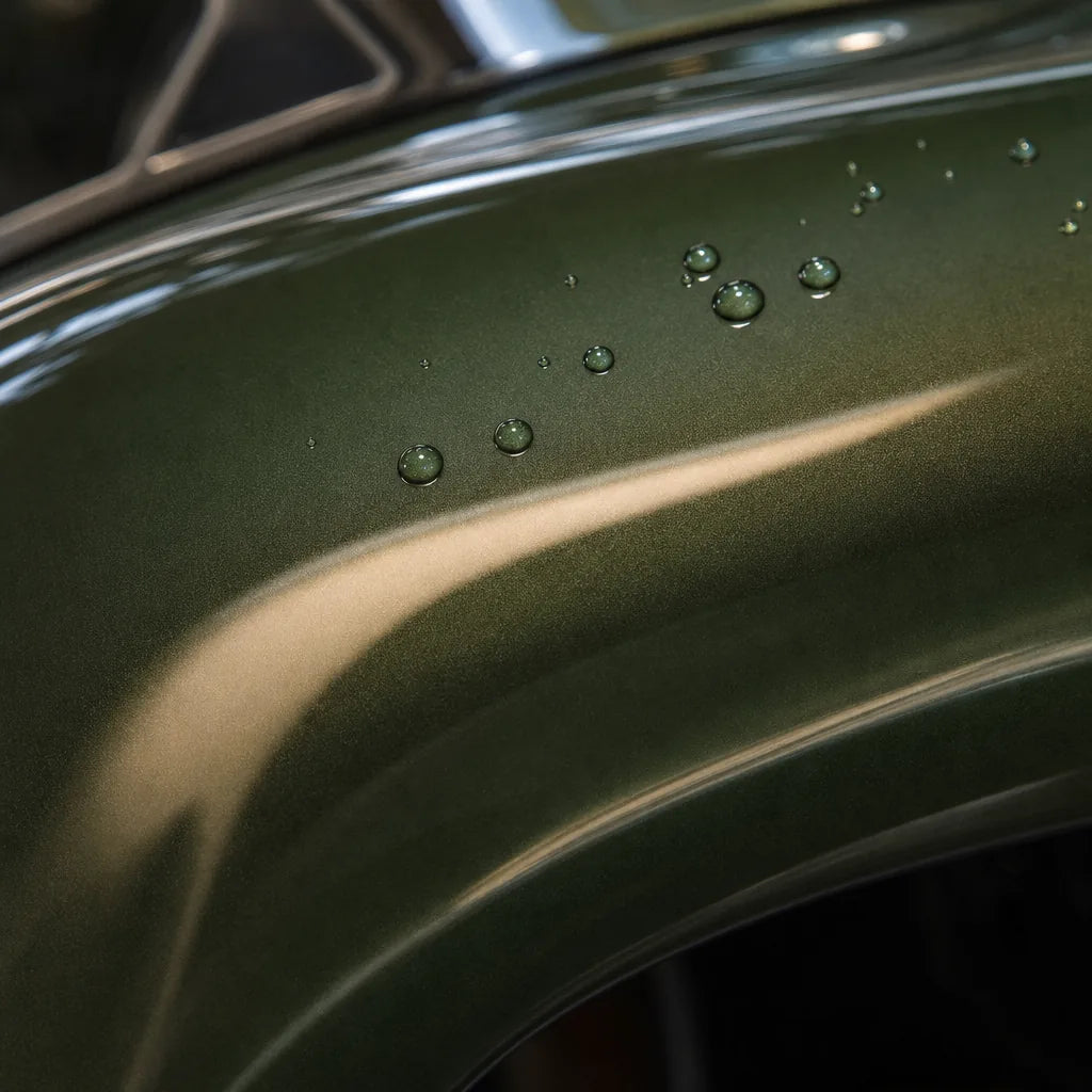 Close-up of Ultimate Flat Military Green gloss colored PPF surface texture | Veloro