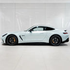 Ultimate Flat Mineral White gloss colored PPF wrapped on a Mercedes-AMG GT side profile | Veloro