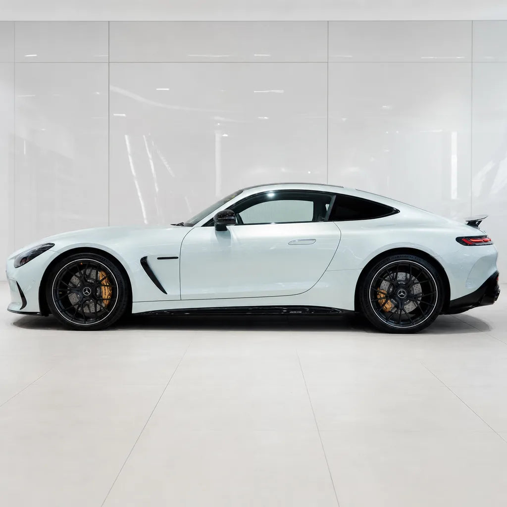 Ultimate Flat Mineral White gloss colored PPF wrapped on a Mercedes-AMG GT side profile | Veloro