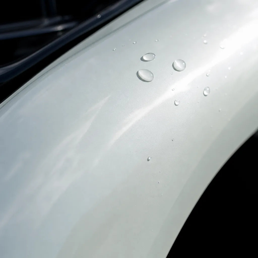 Close-up of Ultimate Flat Mineral White gloss colored PPF surface texture | Veloro