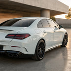 Luxury car wrapped in Ultimate Flat Mineral White gloss colored PPF at golden hour | Veloro